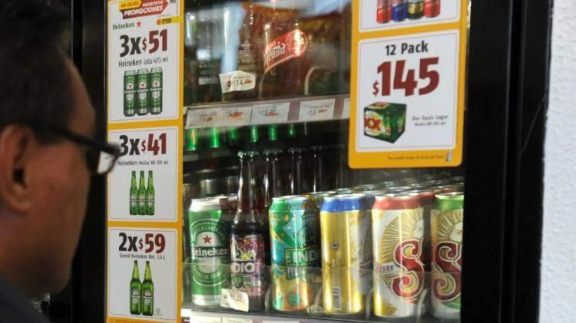 cerveza oxxo MAURICIO HUIZAR